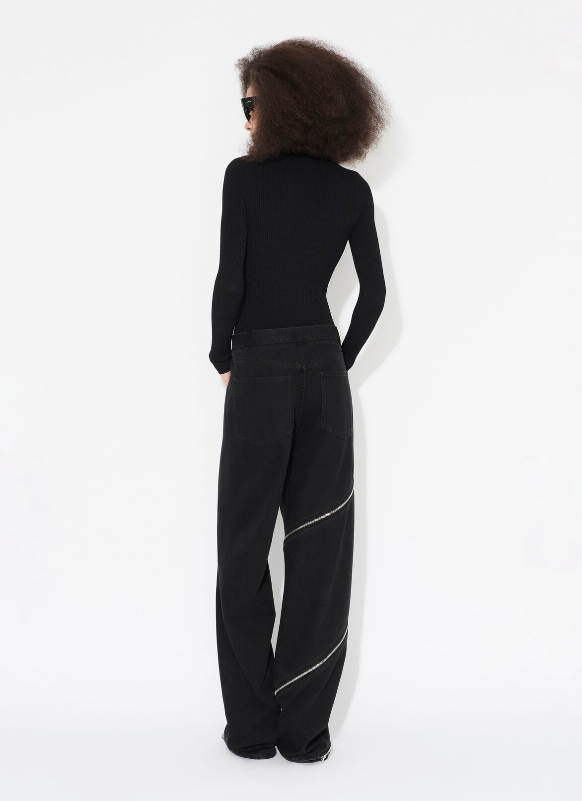 VAQUEROS ESPIRAL DE DENIM ALAÏA NEGRO VAQUEROS ESPIRAL DE DENIM
